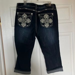 Dark wash capri length with embellishment